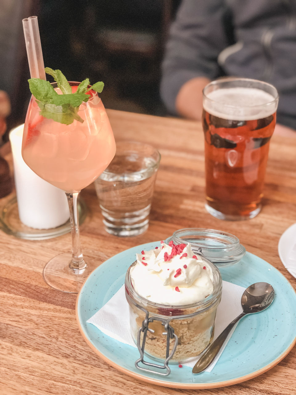 A traditional Danish dessert, a cocktail, and a beer at Katz in Copenhagen, Denmark