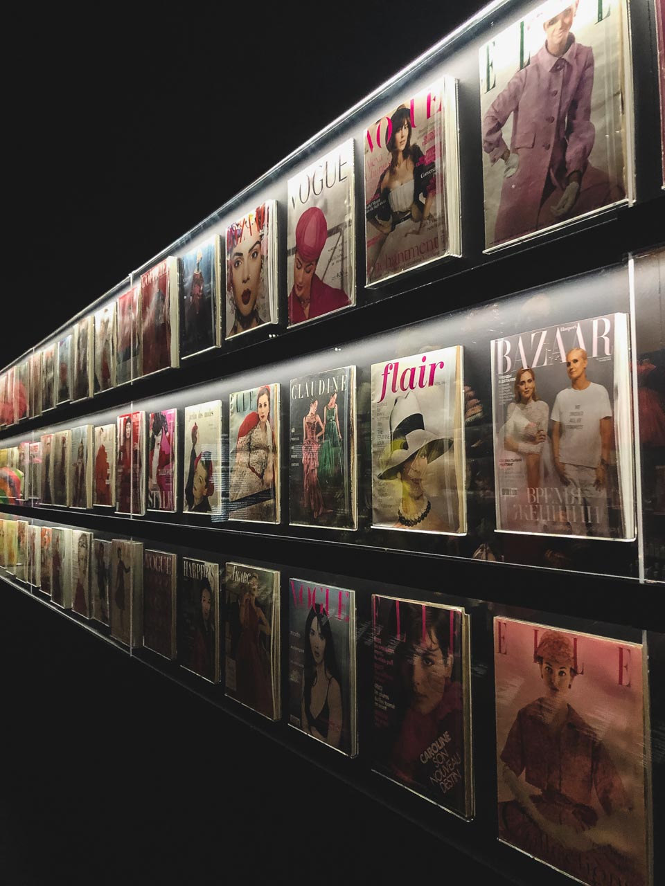 Magazine covers featuring Dior looks at the Victoria and Albert Museum in London