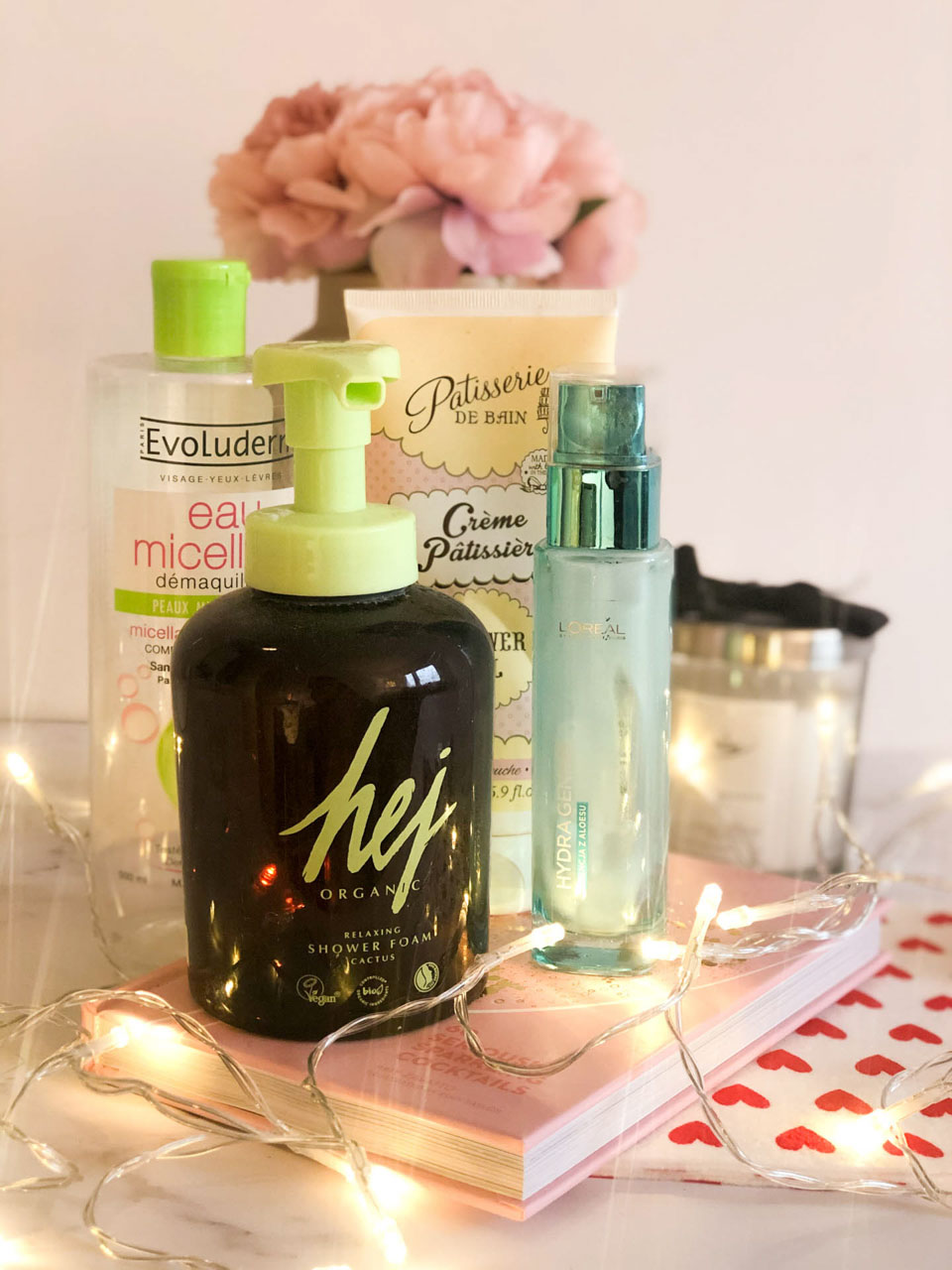 A number of skincare and bath products on a desk
