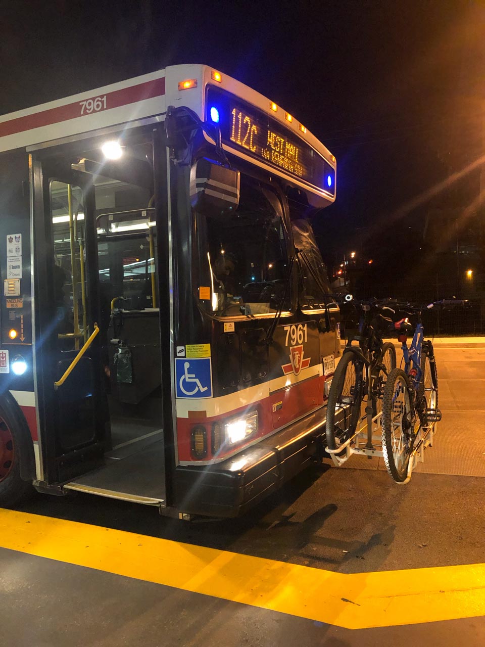 A public bus in Toronto with bike racks in the front