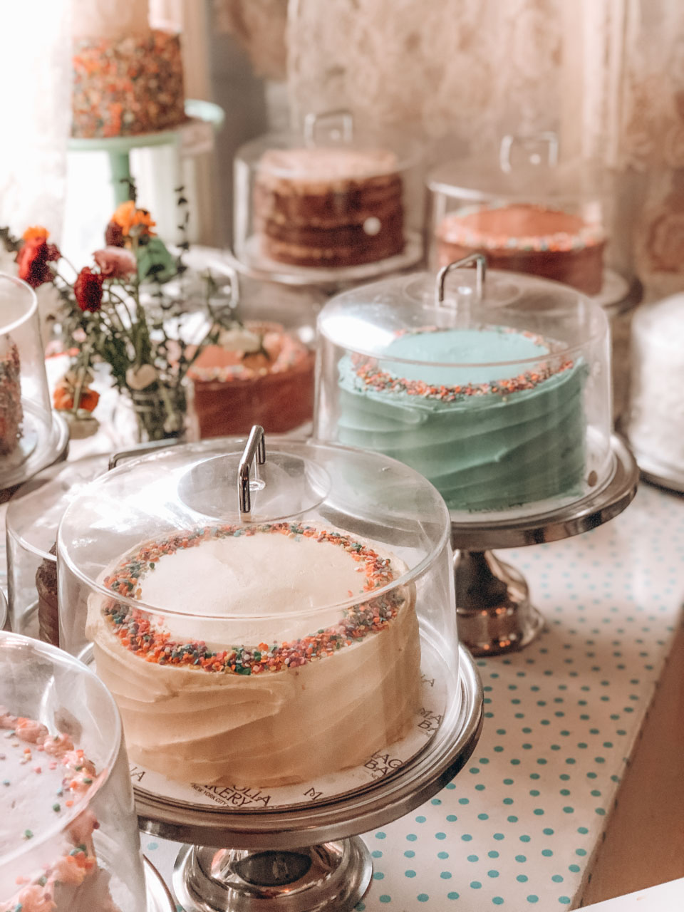 Various cakes on display in Magnolia Bakery on Bleecker Street