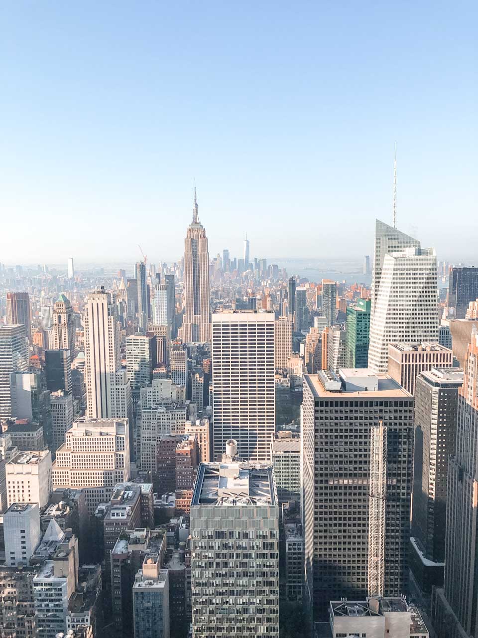 The view of the Manhattan skyline including the Empire State Building seen from Top of the Rock