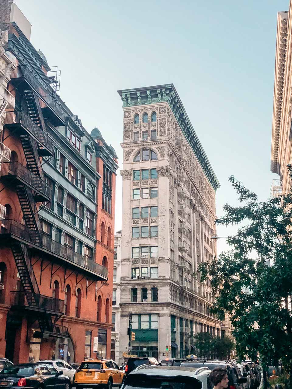 A cast iron building on the corner of Broome Street and Broadway, New York