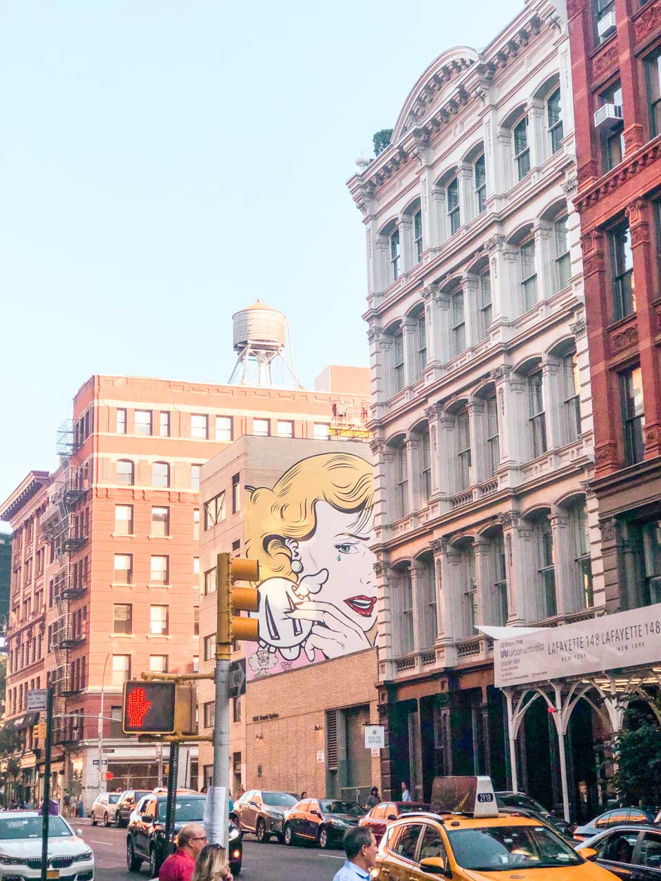 A pop art crying woman mural in Broome Street, New York