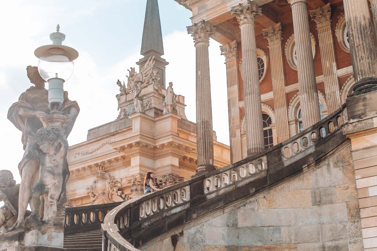 A girl walking up the stairs of the UP Transfer GmbH at the University of Potsdam