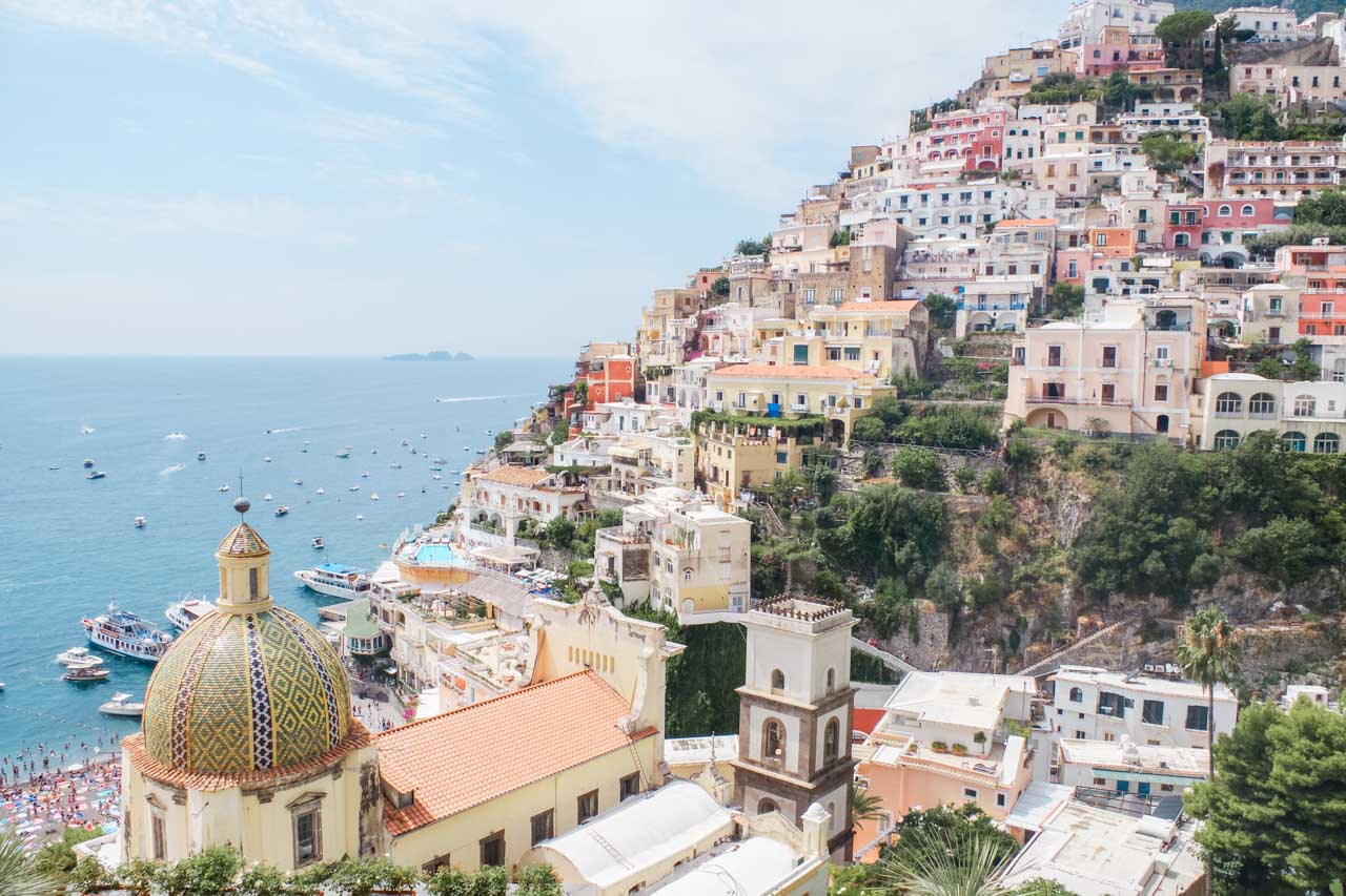 Amalfi Coast and pastel hillside houses seen from the terrace of Le Sirenuse Hotel in Positano
