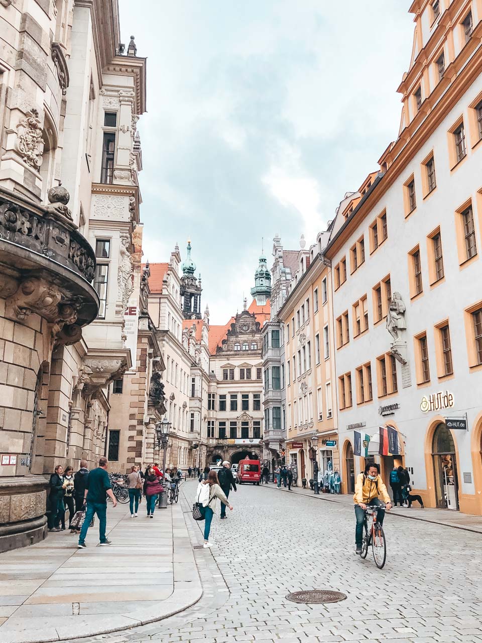 People walking down the street in Dresden's Old Town area