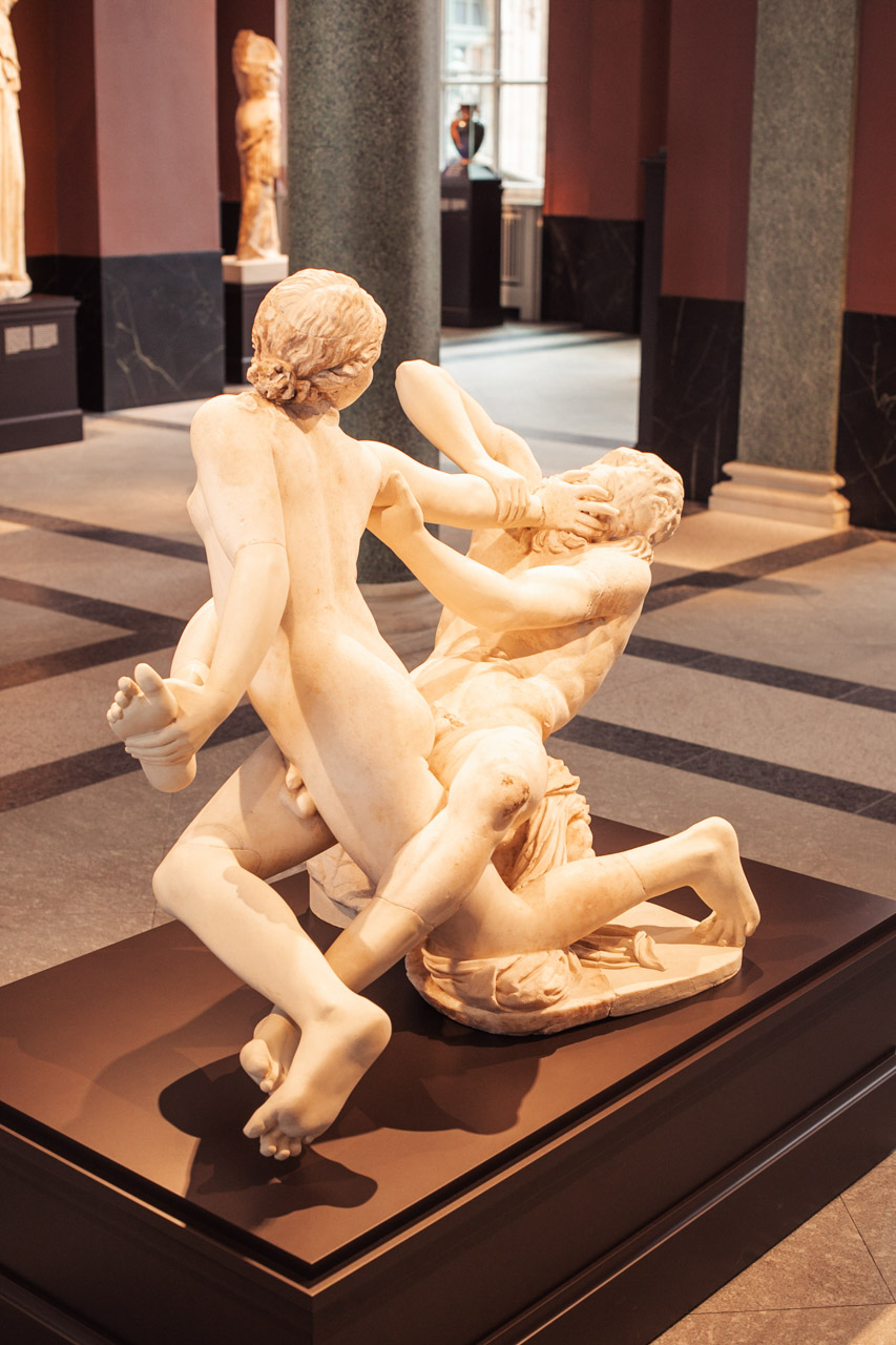 An ancient sculpture of a man and a woman fighting on display at the Old Masters Gallery in Dresden
