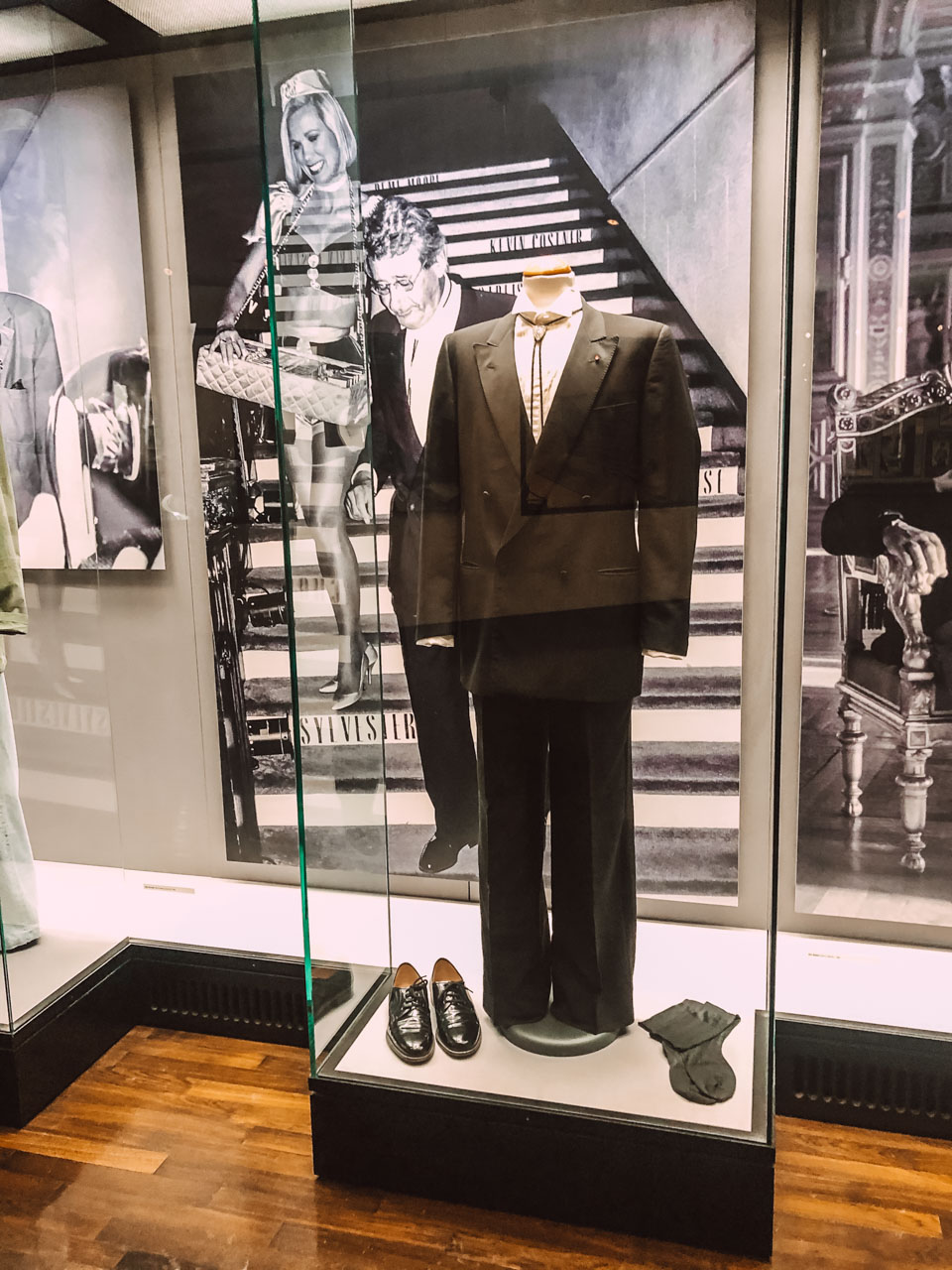Helmut Newton's suit and shoes inside a glass display case at the Museum of Photography in Berlin
