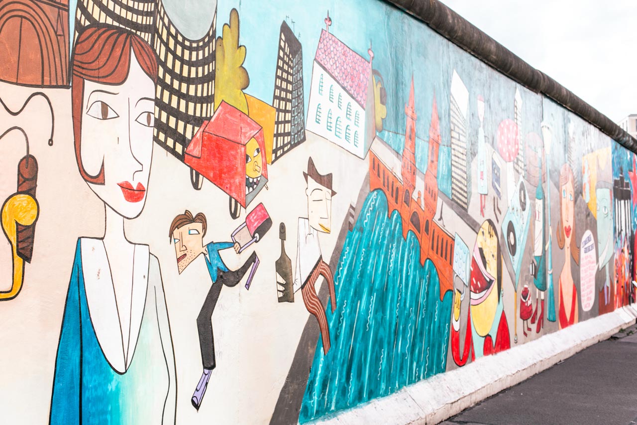 A pop art mural by Jim Avignon at the East Side Gallery of the Berlin Wall