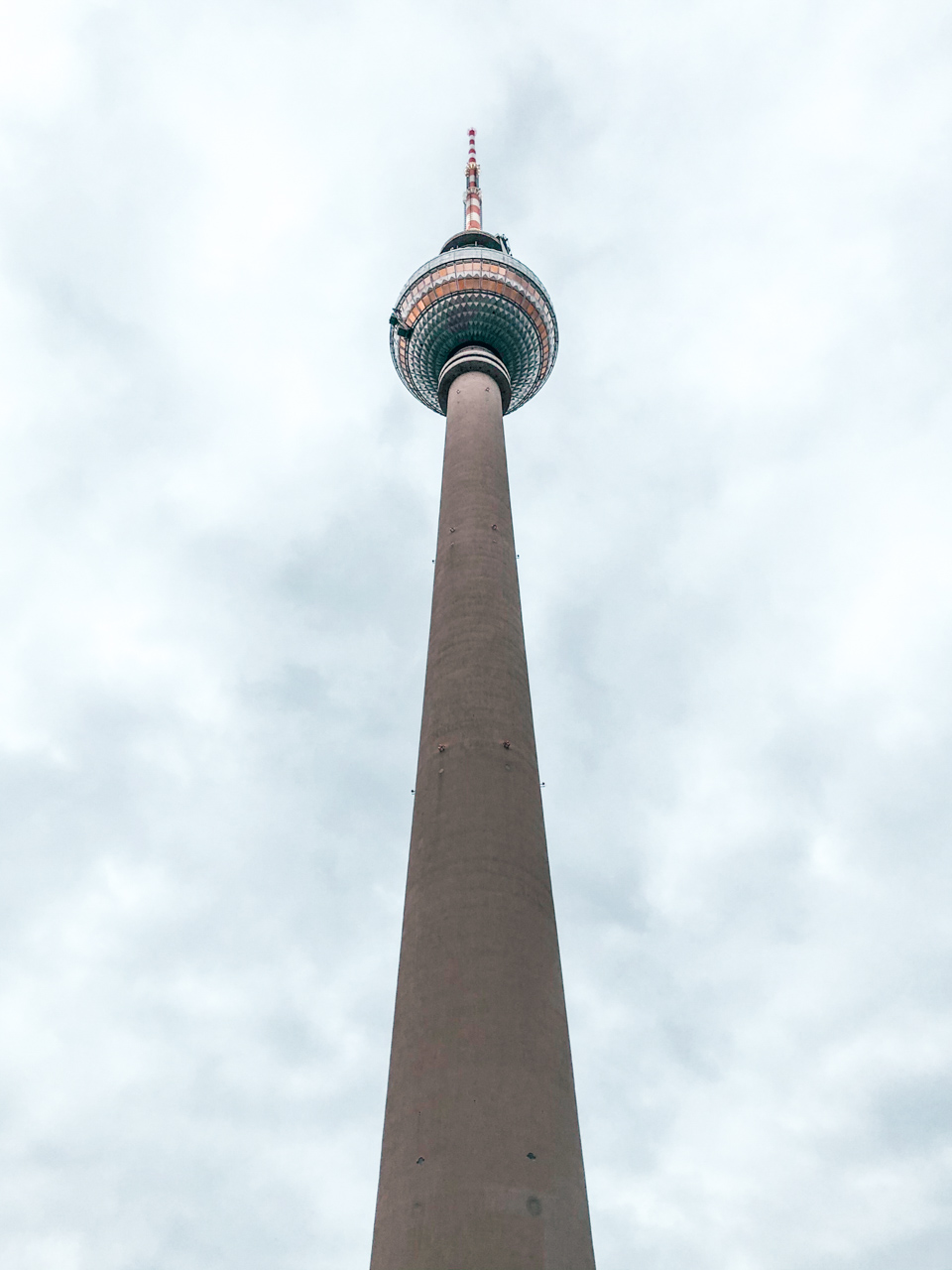 Berliner Fernsehturm (Berlin TV Tower) seen from below during the day