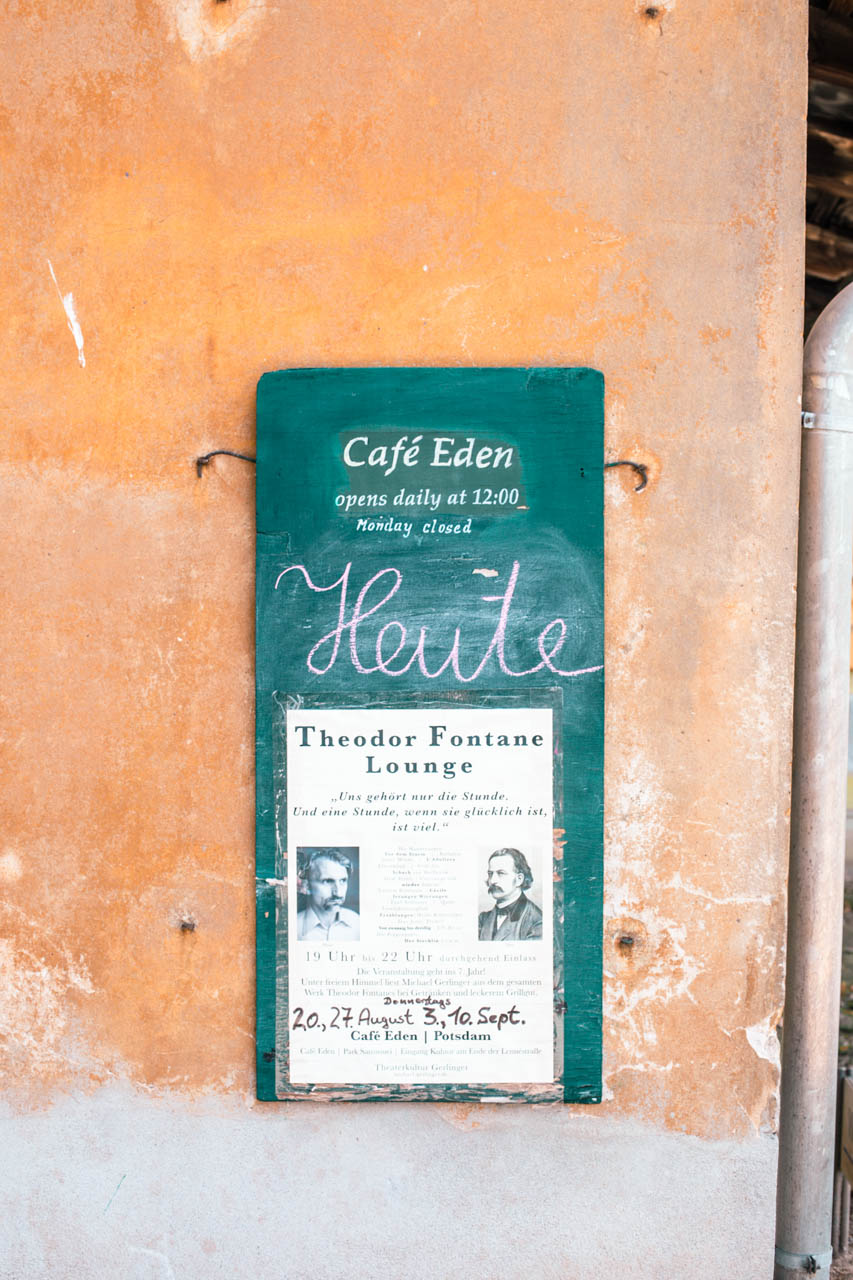 A leaflet on the wall of Café Eden in Potsdam, Germany inviting people to a poetry reading event