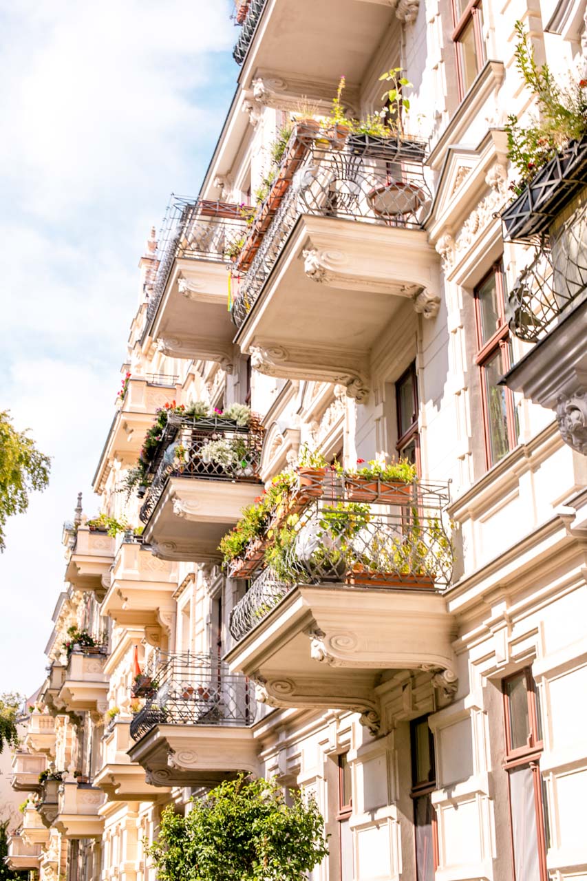 Plant-covered balconies of a tenement house in Potsdam, Germany