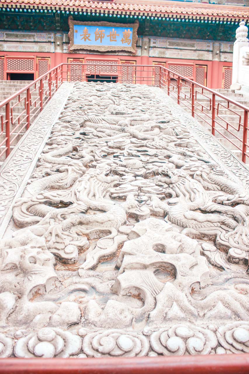 Stone stairs with dragons leading to the Temple of Confucius in Beijing, China
