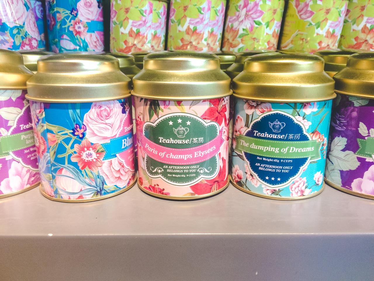 Rows of different flavoured tea tins at a tea shop in Beijing, China