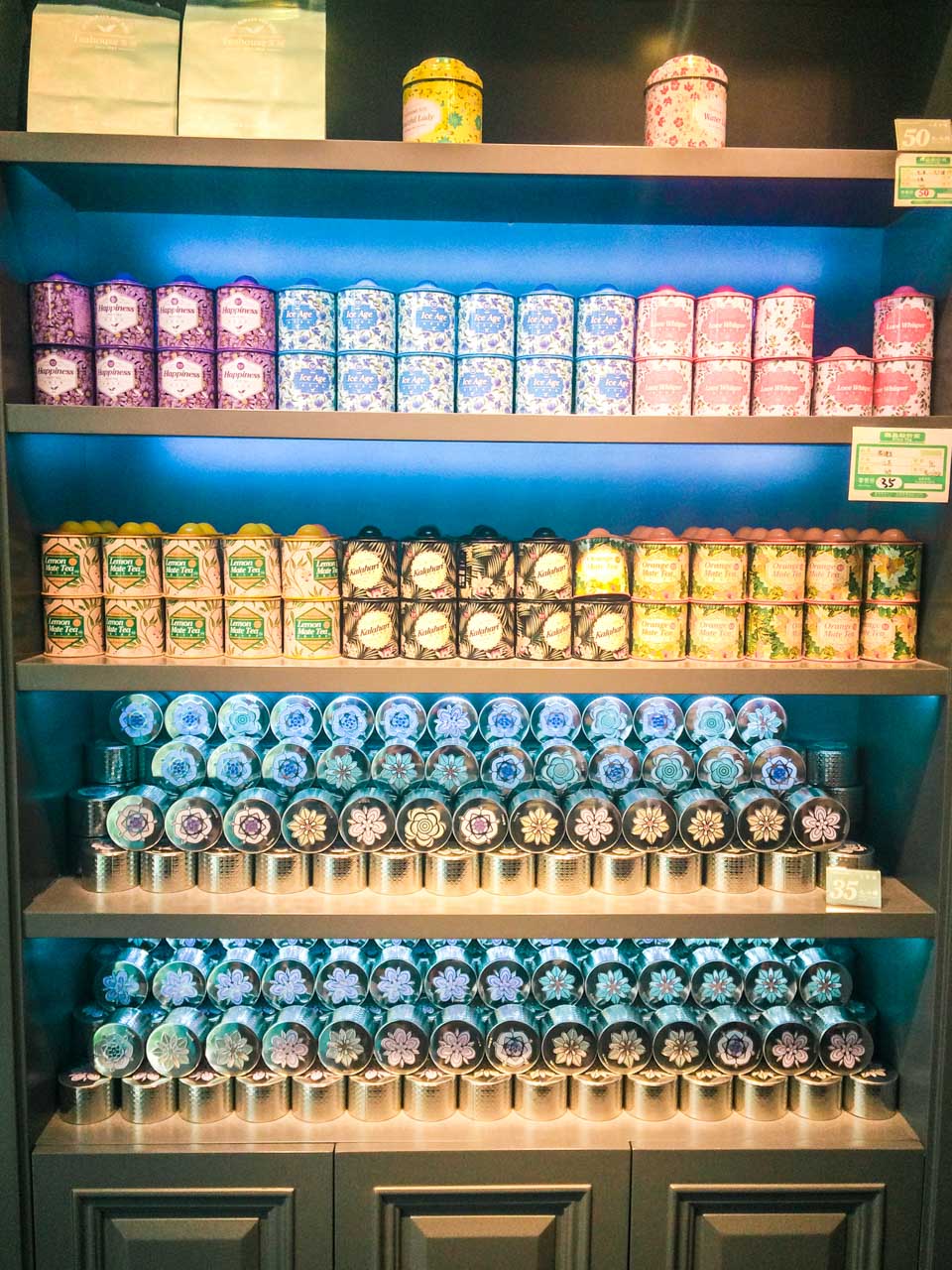 Shelves stacked with tea tins at a Chinese tea shop in Beijing