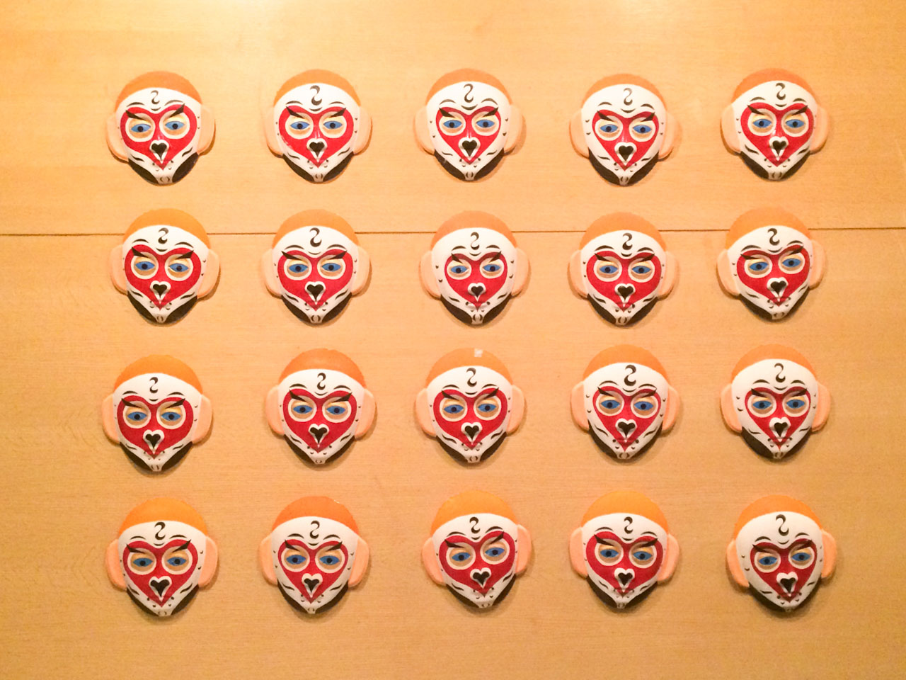Rows of traditional Chinese opera masks hanging on the wall at the Capital Museum in Beijing, China