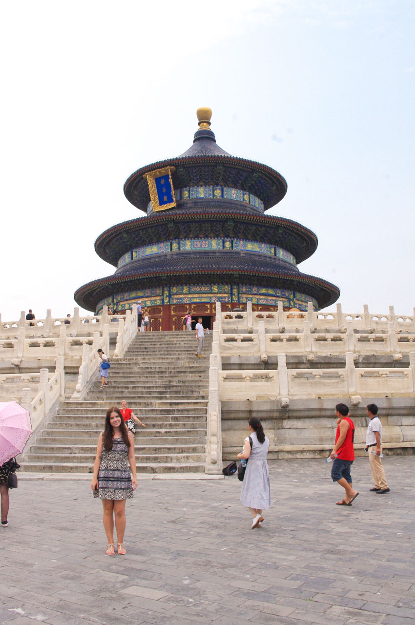 Woman standing in front of the Hall of Prayer for Good Harvests in the Temple of Heaven in Beijing