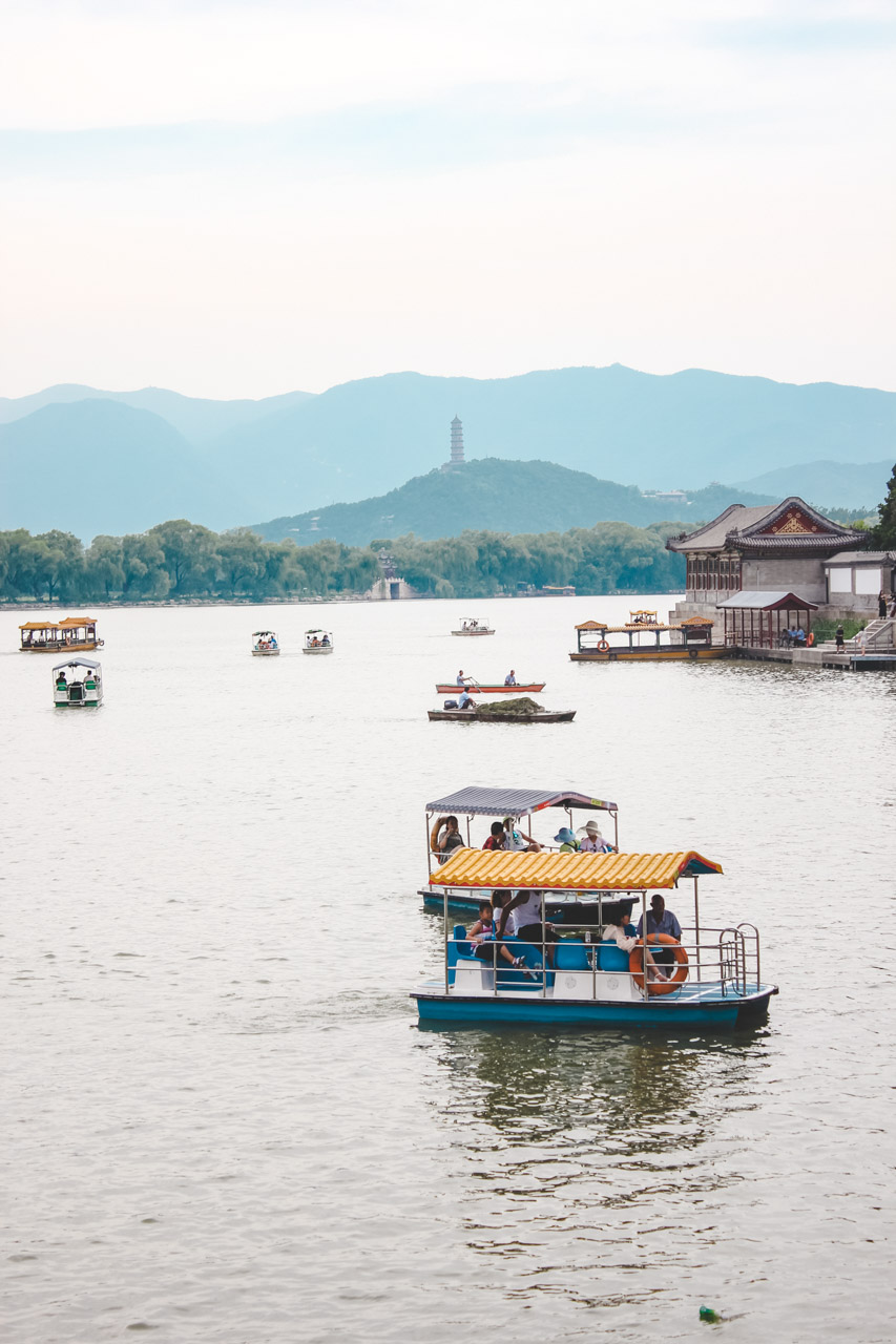 Small boats on Kunming Lake at the Summer Palace in Beijing, China