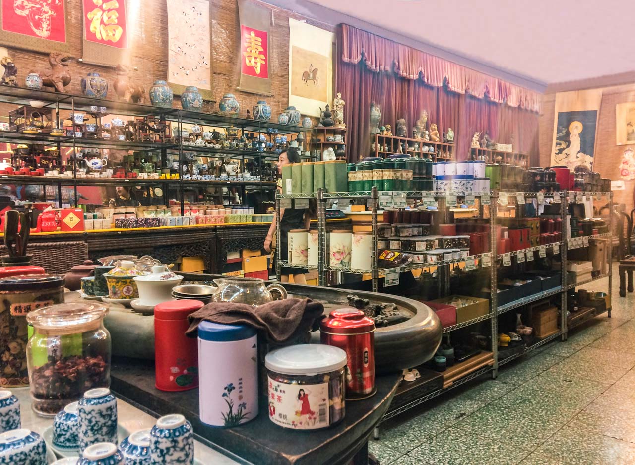 Shelves stacked with different types of tea inside a traditional tea shop in Beijing, China