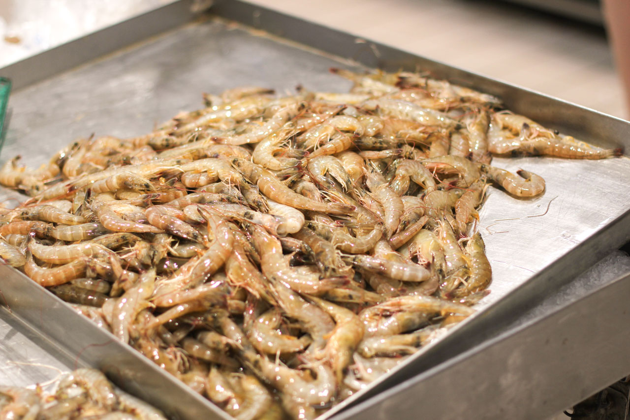 A metal tray filled with shrimps at a supermarket in Beijing, China