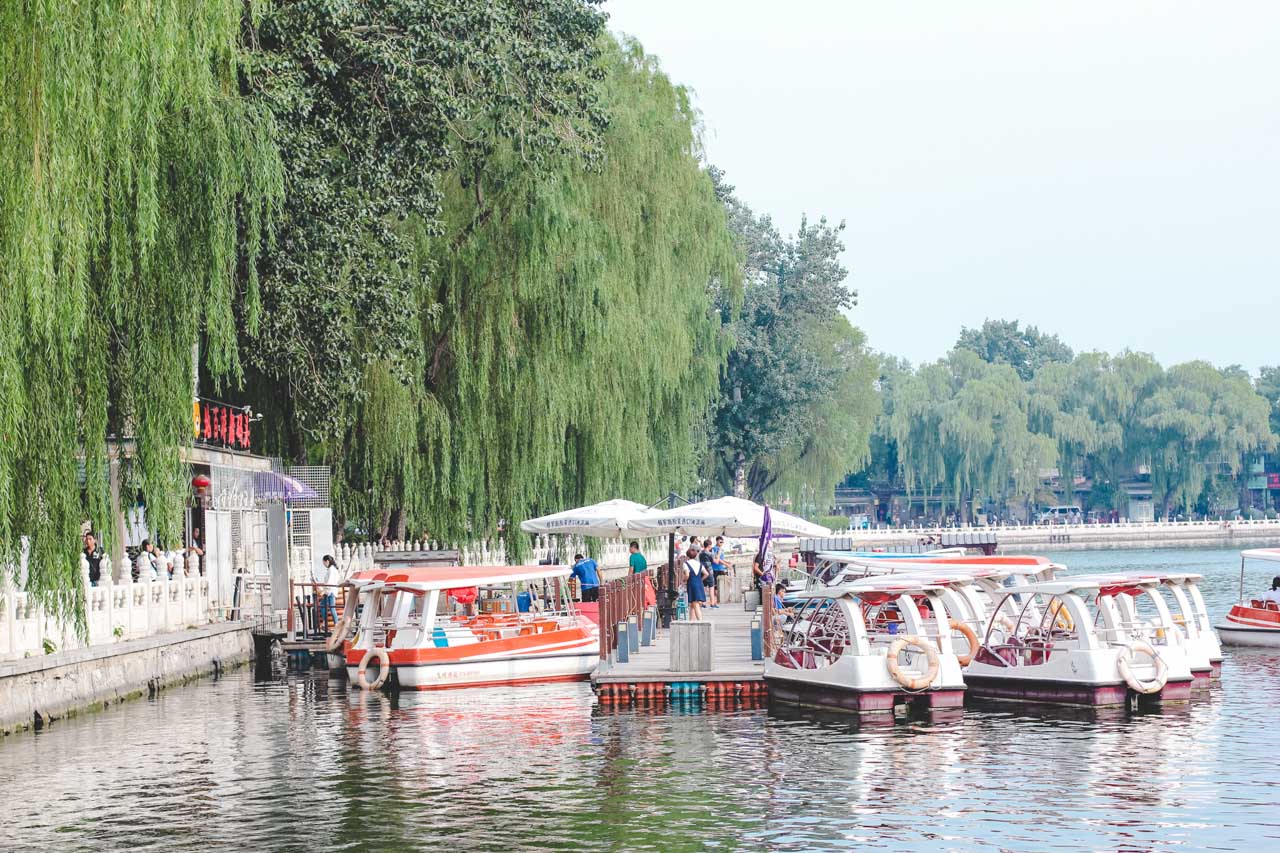 Rows of pedalo boats docked on a lake in Beijing, China