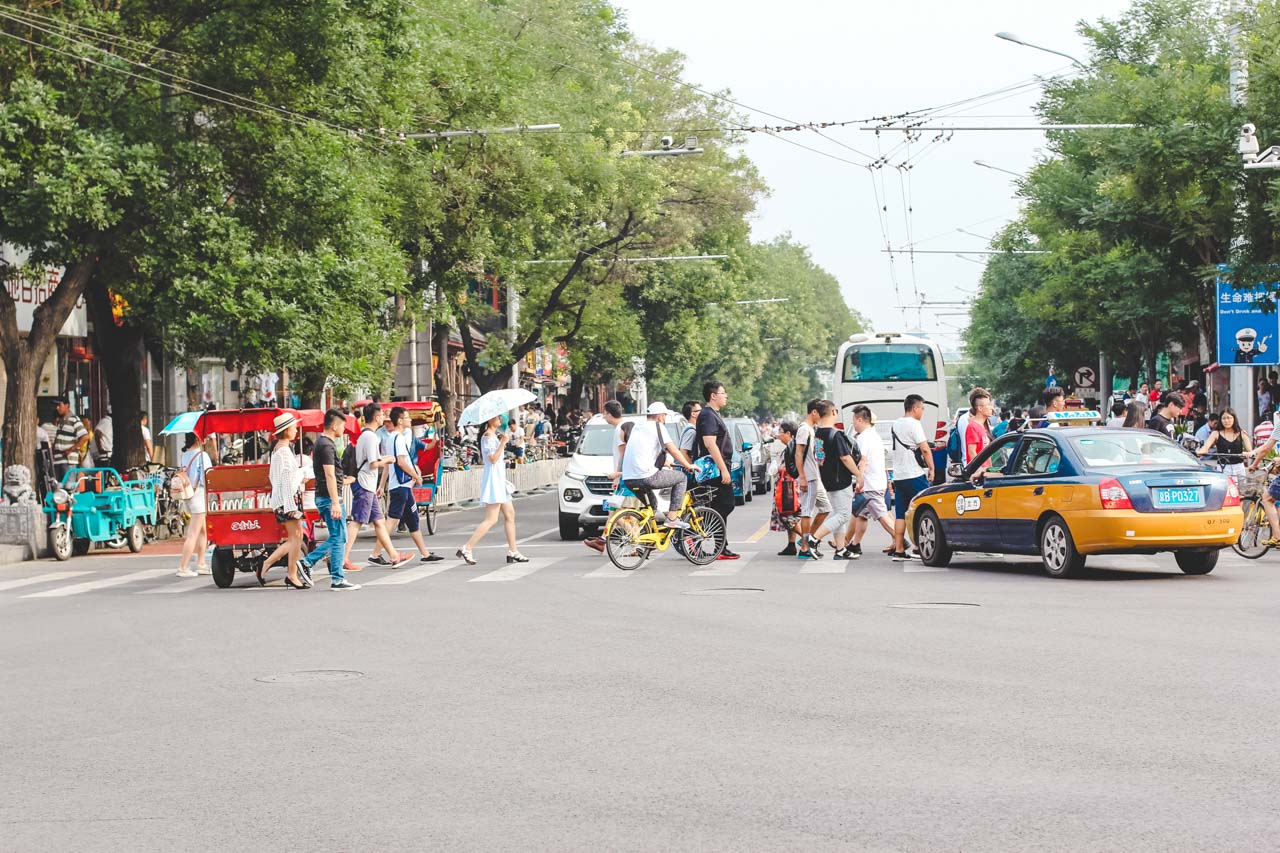 People crossing the street in Beijing, China