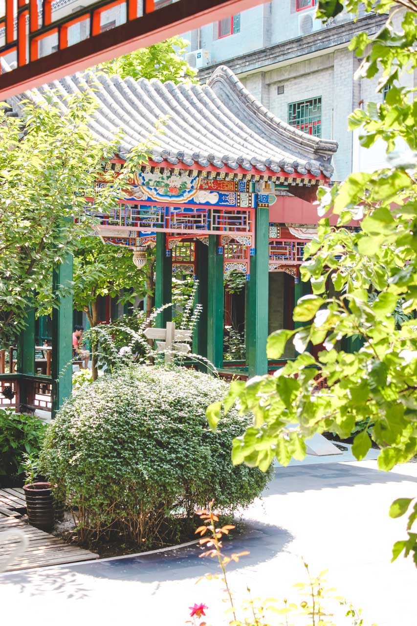 Traditional Chinese gate in the outdoor patio area of Beijing Heyuan International Youth Hostel