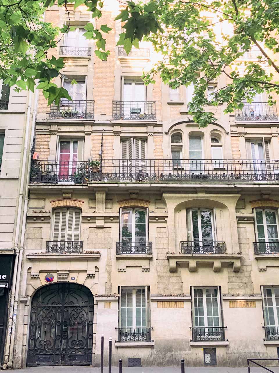 A classic French tenement house in a street of Paris, France