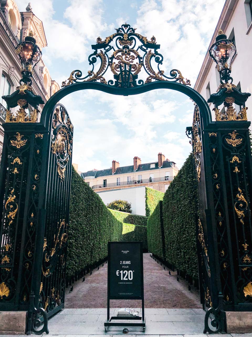 Iron wrought gate to the Abercrombie & Fitch flagship store on Champs-Élysées in Paris, France