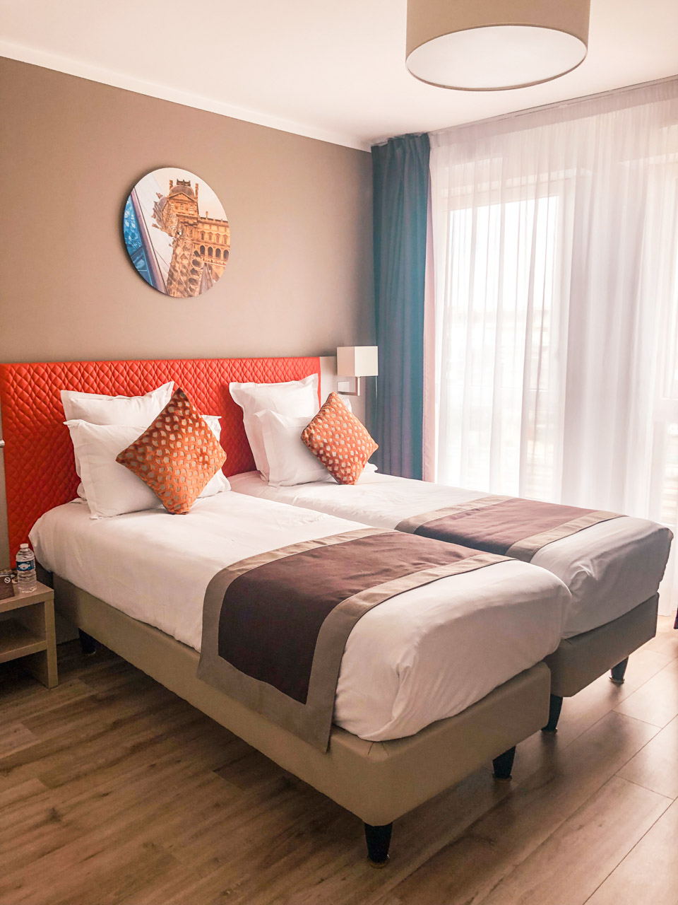 A double bed at the Residhome Rosa Parks hotel in Paris, France