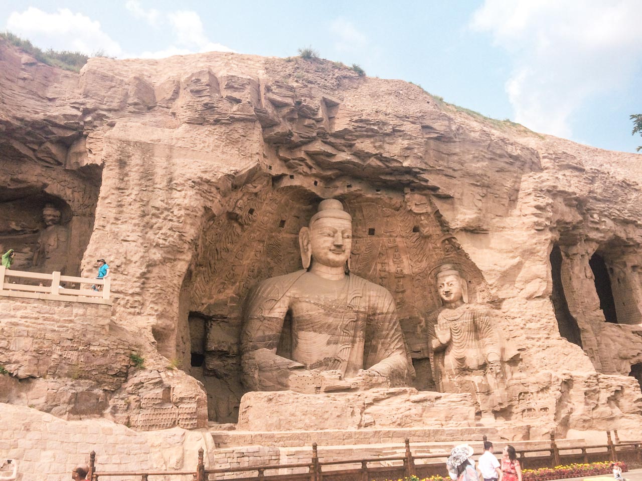 Buddha statues carved into the cliffside at the Yungang Grottoes in Datong, Shanxi
