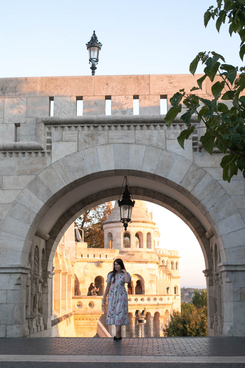 A girl in a maxi dress walking around Fisherman's Bastion in Budapest, Hungary