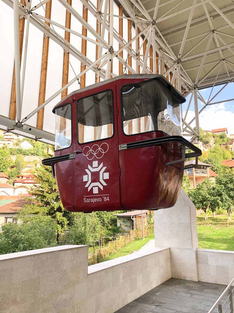 An old red cable car commemorating the 1984 Winter Olympics held in Sarajevo