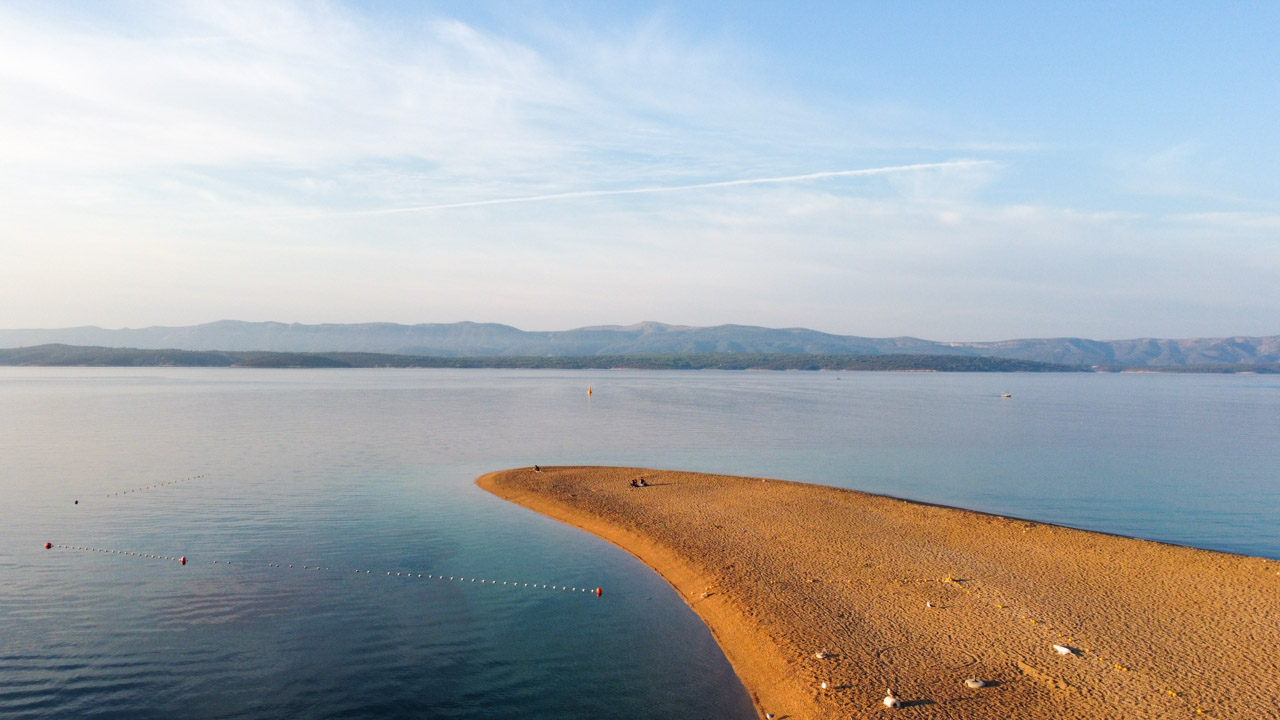 An aerial shot of the Zlatni Rat beach in Bol, Croatia