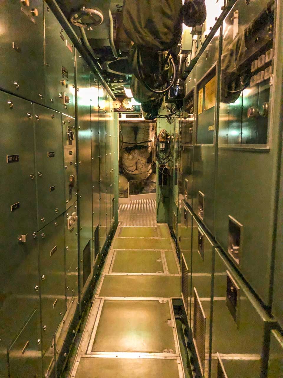 A narrow corridor inside an old submarine at Marinmuseum in Karlskrona