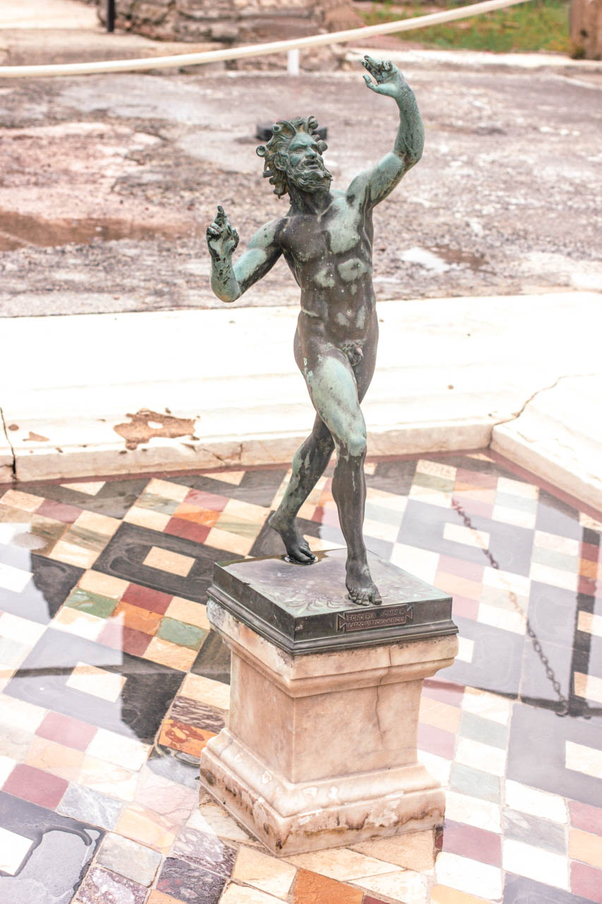 Statue of the Faun at the House of Faun (Casa del Fauno) in Pompeii