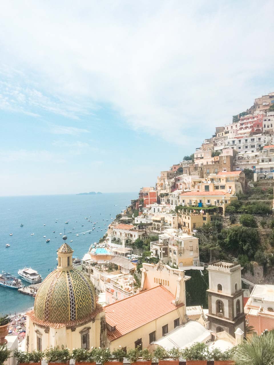 A view of the sea and hillside houses seen from Le Sirenuse Hotel in Positano, Italy