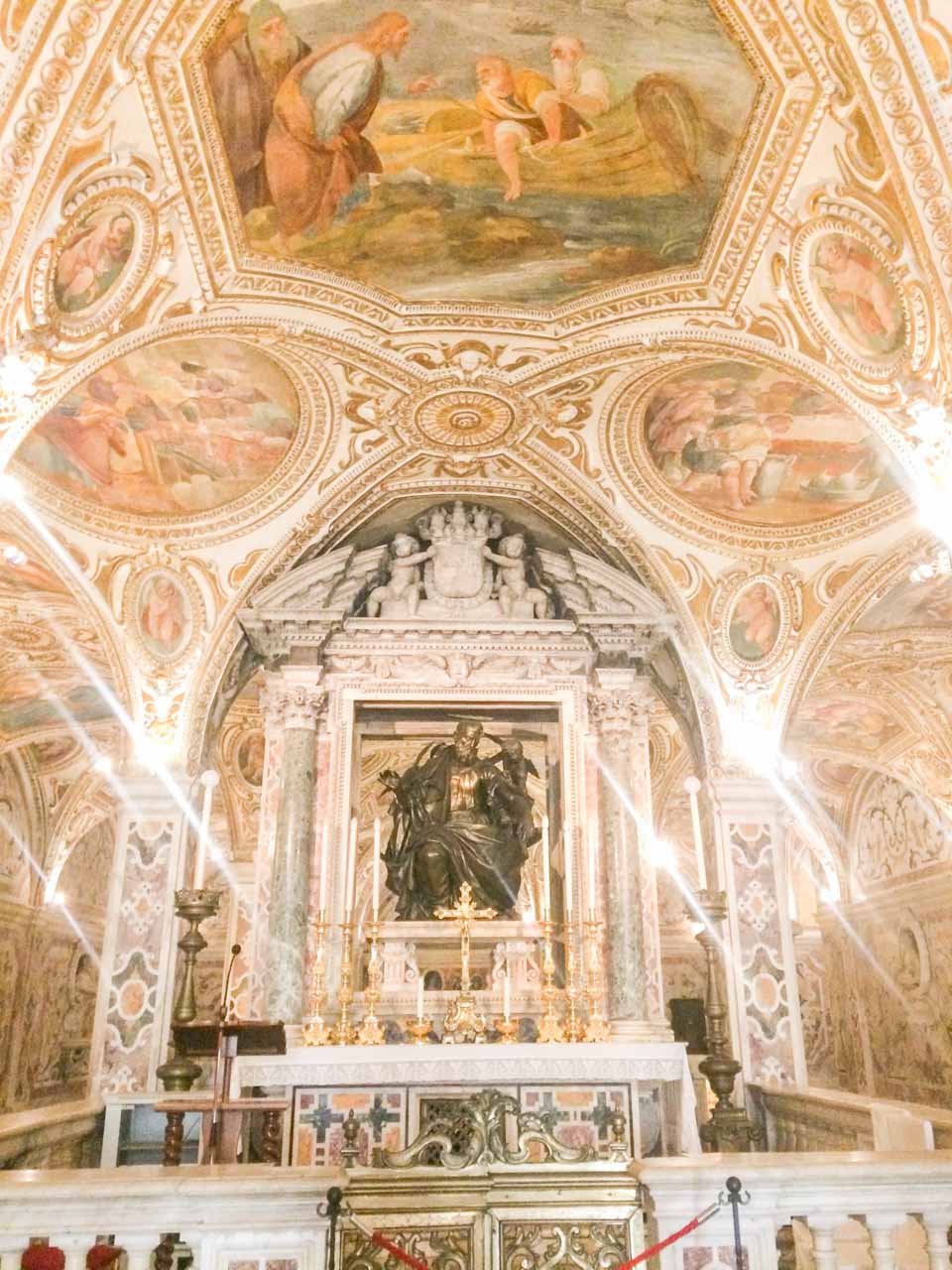 Sculptures and an altar inside the crypt that houses the relics of Saint Matthew in Salerno, Italy