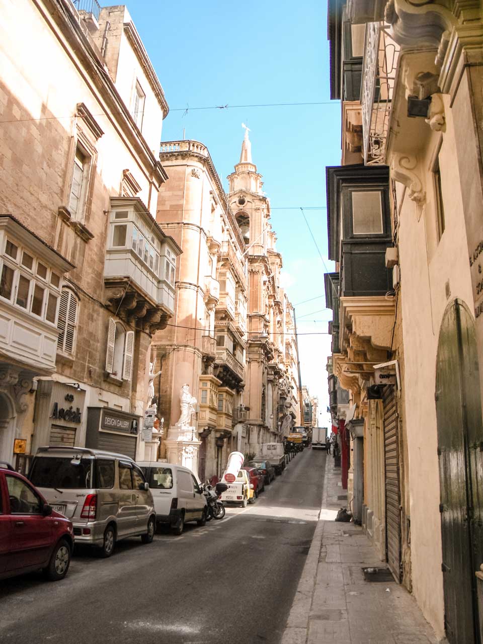 A street in Valletta, Malta lined with cars