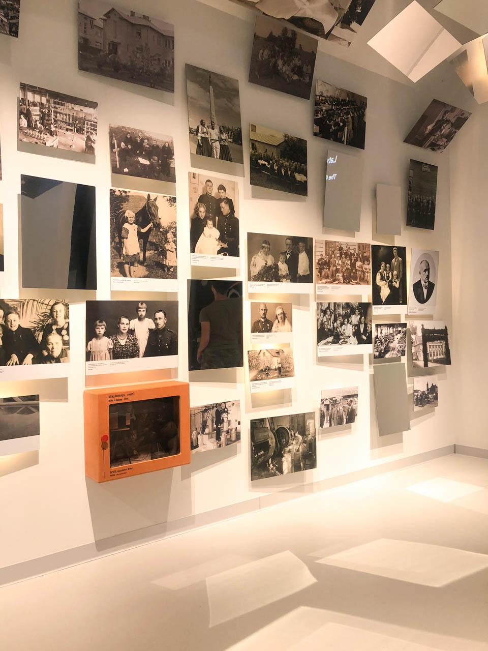 Photographs on the wall at the Museum of the Occupation of Latvia