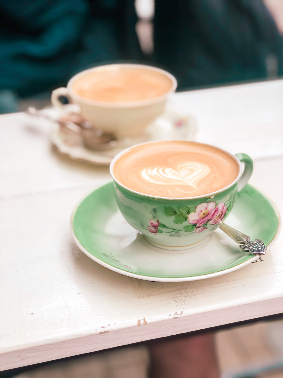 Two cups of coffee in vintage-looking crockery