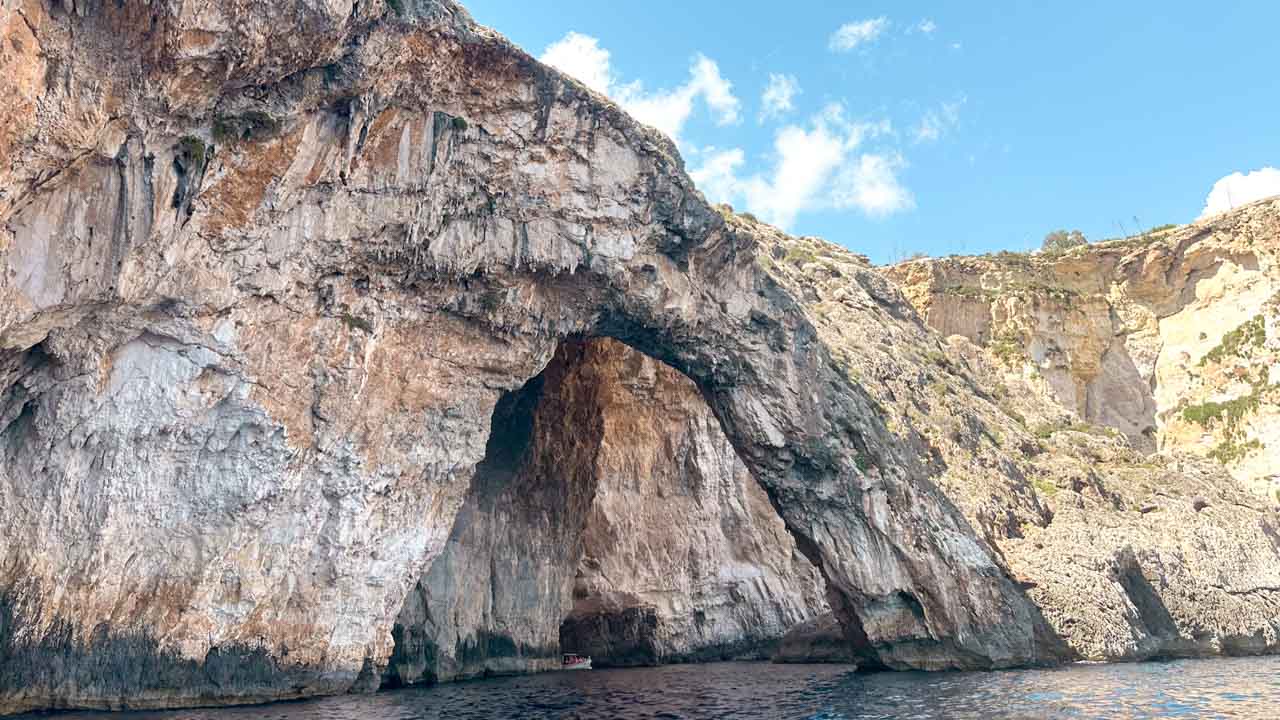 The arch of the Blue Grotto in Malta seen from the water