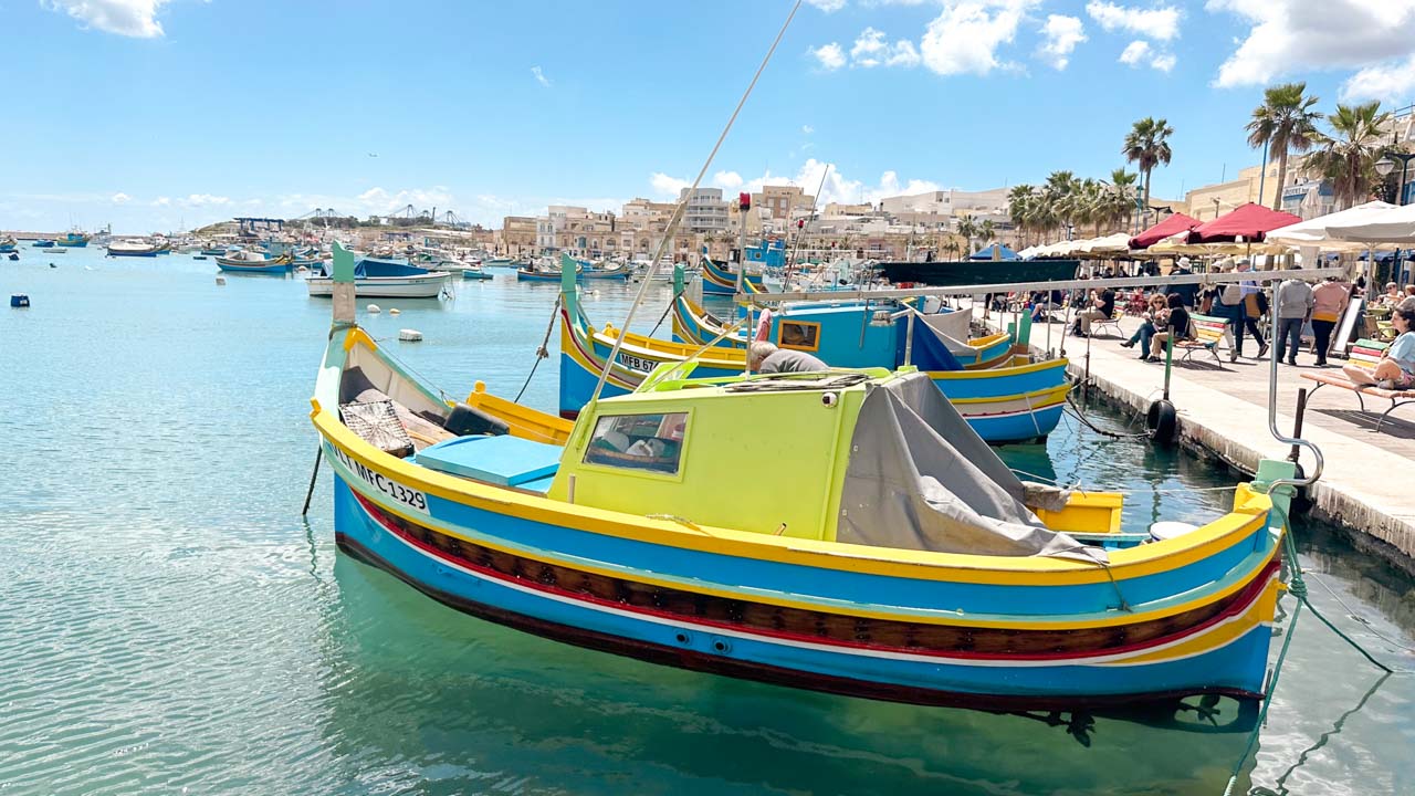 A traditional Maltese fishing boat, named luzzu, in the Marsaxlokk harbour in Malta
