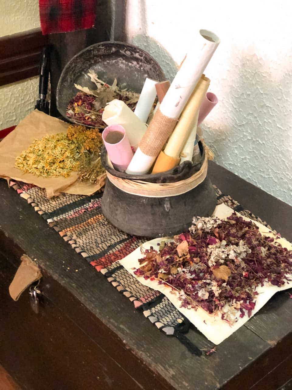 Dried flowers and rolled up paper at the National Workshop For Handmade Paper in Ohrid, North Macedonia