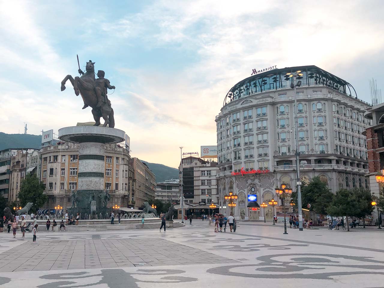 People walking around Macedonia Square in Skopje