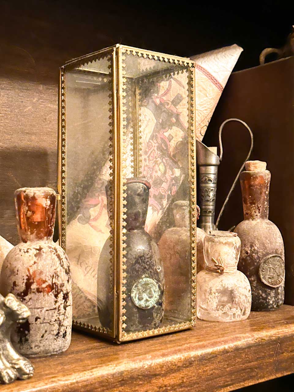 Bottle of 16th-century potion on a shelf at Speculum Alchemiae in Prague