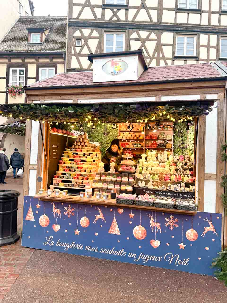 A candle stall at the Colmar Christmas Market on Place de l'Ancienne Douane