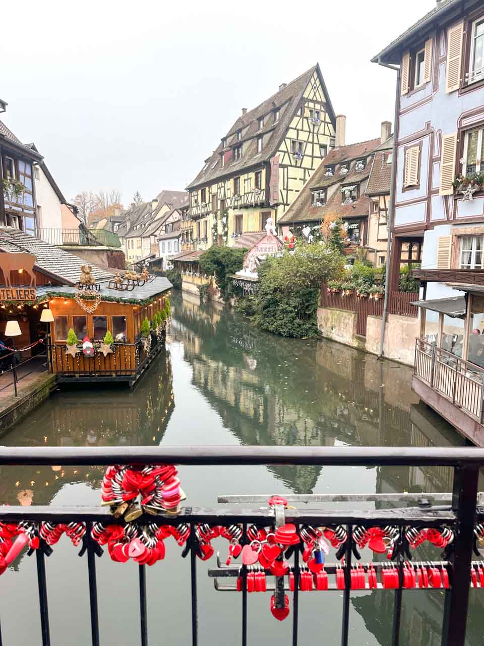 Half-timbered houses in the Petite Venise area of Colmar seen from a bridge