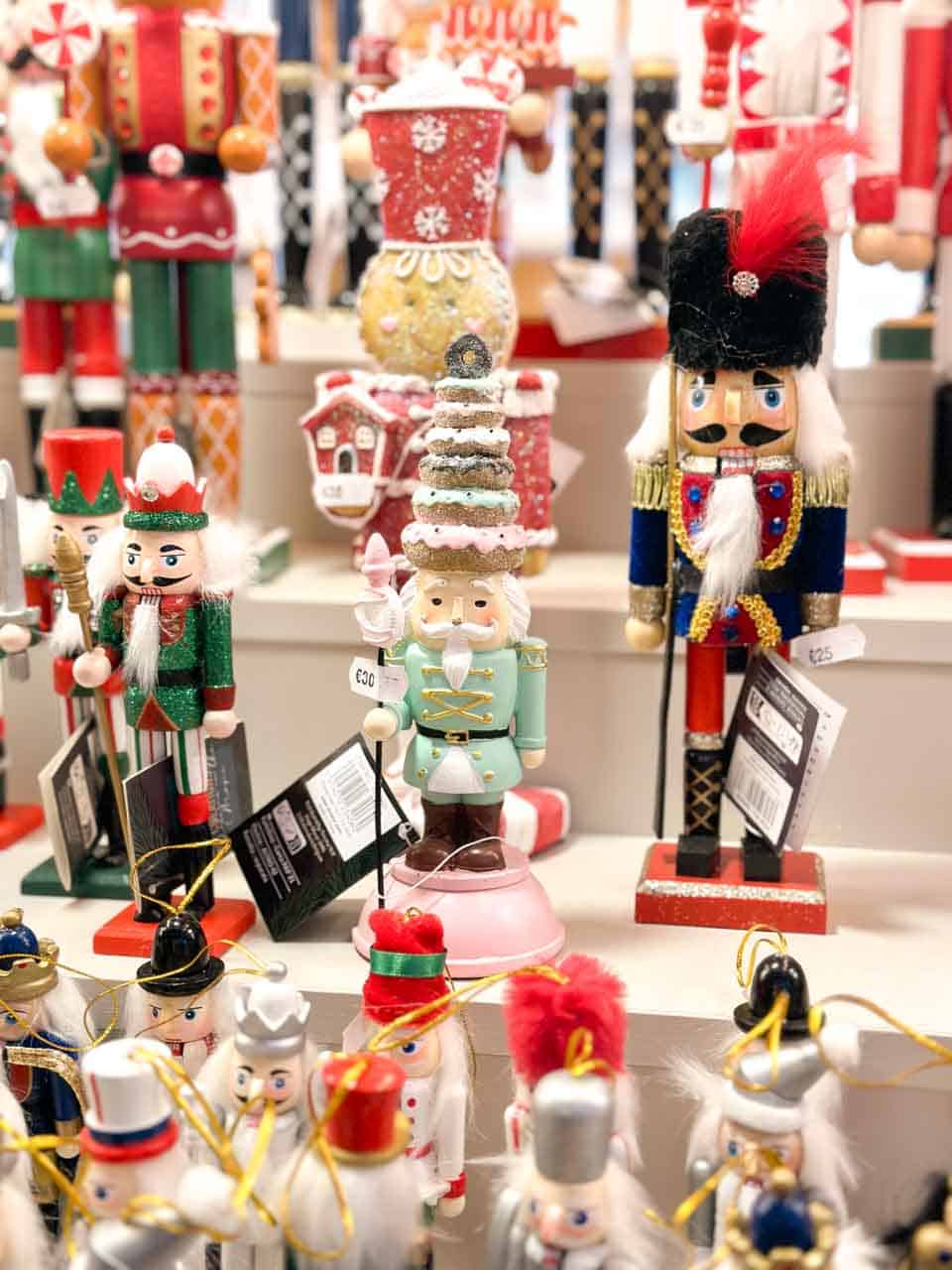 Nutcracker figures lined up on a market stall in Strasbourg